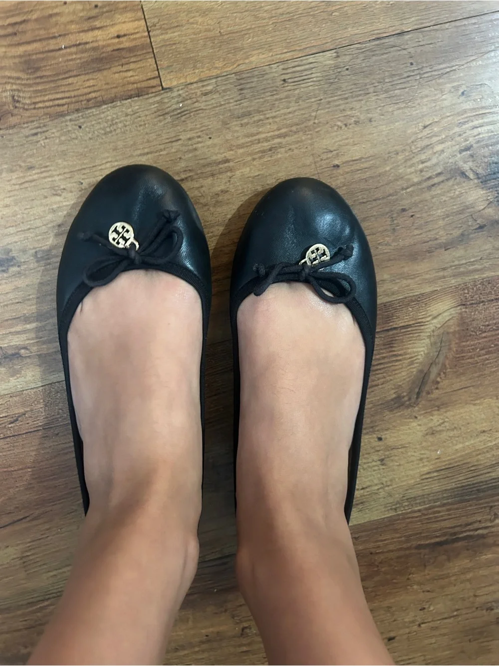 Tory Burch Black Leather Logo Ballet Flats with Gold Medallion